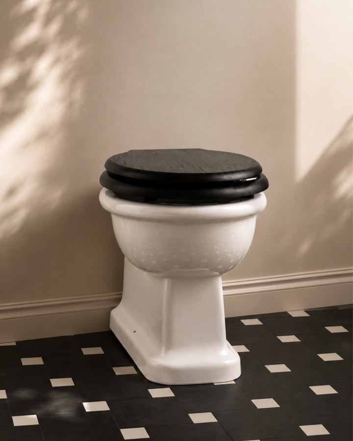 Etoile back-to-wall toilet i hvid keramik fra Devon&Devon